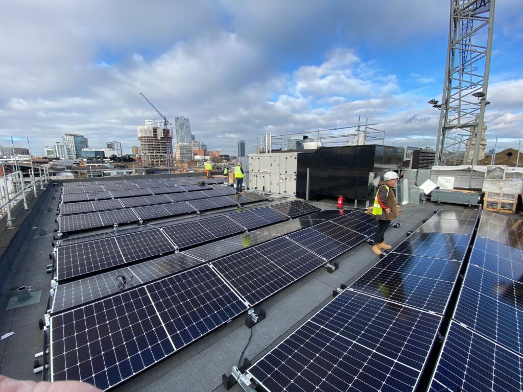 Engineers installing rooftop solar panels – Ablaze Green Energy.